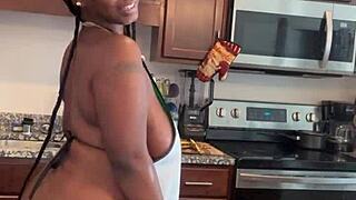 Ebony bbw whipping up banana pudding with her massive natural tits on display. Food play gets steamy!