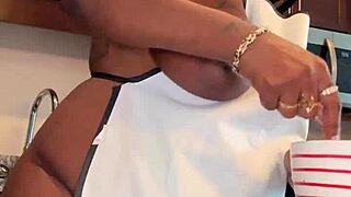Ebony bbw whipping up banana pudding with her massive natural tits on display. Food play gets steamy!