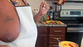 Ebony bbw whipping up banana pudding with her massive natural tits on display. Food play gets steamy!