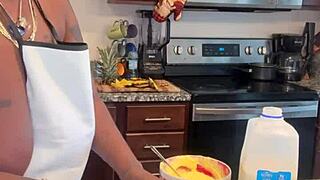 Ebony bbw whipping up banana pudding with her massive natural tits on display. Food play gets steamy!