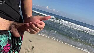 two girls look at my cock while i masturbaate on the beach and i invite them to help.