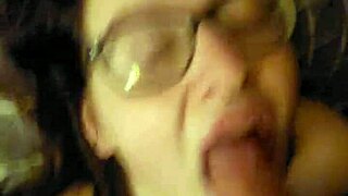 Belle tied down for intense throat humiliation close-up.