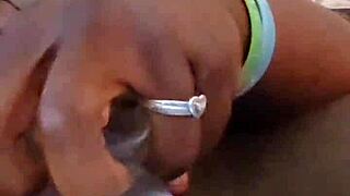 Ebony woman explores self-pleasure with toys at home