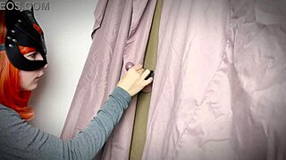 A ginger girl discovers a gloryhole and teases with a blowjob