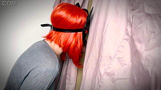 A ginger girl discovers a gloryhole and teases with a blowjob