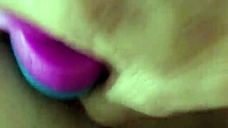 Chubby brunette uses rainbow dildo for anal gaping