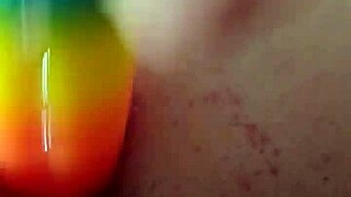 Chubby brunette uses rainbow dildo for anal gaping