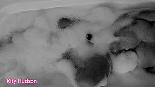 Kity Hudson Plays With Toy In Bath