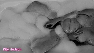 Kity Hudson Plays With Toy In Bath