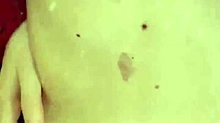 Nasty fetish mistress Elza Koms teases with wet tongue and striptease.