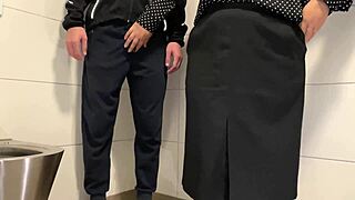 Juicy milf wanks cock in public toilet