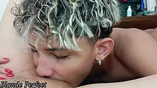 Skinny tattooed cutie gets tasty licking from young stud in bedroom