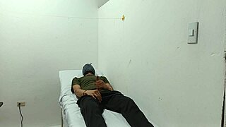 I watch the kinky doctor stroke his huge cock in the office