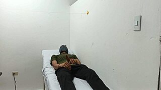 I watch the kinky doctor stroke his huge cock in the office