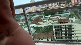 carioca guy meets japanese girl on hotel balcony in pov