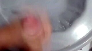 Jerking off in the bathroom after soccer game, solo amateur moment