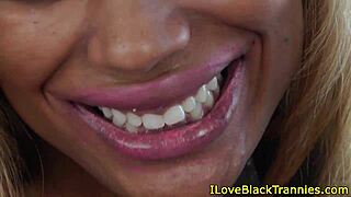 Tugging Ebony Shemales Share Intimate Moments on Sofa in Stockings