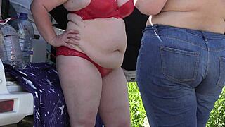 mature lesbians with big asses caught outdoors by voyeur's hidden camera.