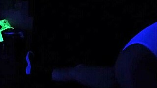 Carrie B engages in intense blacklight sex session