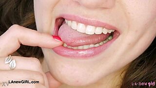 Cute brunette model flaunts sexy body on sofa