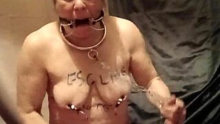 I’m so into this French milf’s solo bondage with mouth spreader and belt