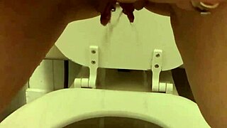 my pretty pierced pussy dripping while peeing in bathroom homemade