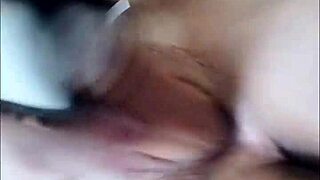 Woman uses large thick dildo to fuck her wet dripping pussy, ripping clothes in the process