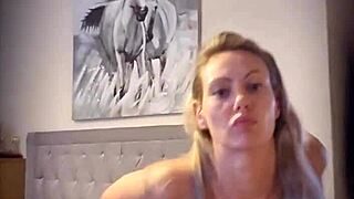 Blonde milf performs little striptease