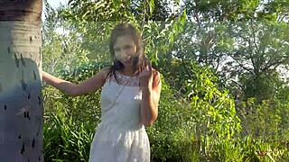 this lesbian scene starts with kissing and fingering, leading to masturbation and fucking outdoors with natural tits