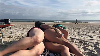 damn, getting dick in her ass right on a public beach