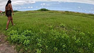 nicoly seduces firefighter on beach with subtle outdoor tease
