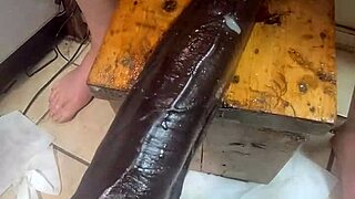 Huge dildo double penetrates anal solo