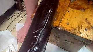 Huge dildo double penetrates anal solo