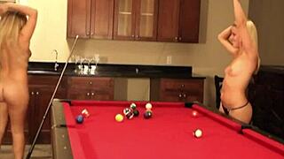 cute baby lesbian flaunts natural tits during a steamy billiard game