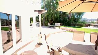 pouring oil on mom's back by pool