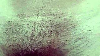 Check out this cute young prostitute with small tits going out in a short without panties, her hairy pussy on display!