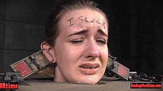 Gagged Drooling Brunette Is Dominated in Rough Garage Play