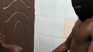 Fat curvy woman bent against bathroom wall screaming during homemade flashing