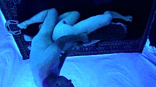 GIGI BREEZE GETS CHOKING AND GAGGING DURING BLACKLIGHT MASSAGE WITH DEEPTHROAT