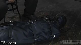 Restrained girl is punished in garage