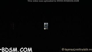 The captivating brunette slave masturbates her wet pussy with vibrator in hardcore BDSM session