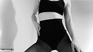 Sexy brunette teases her ass and feet in fishnet tights from a POV angle