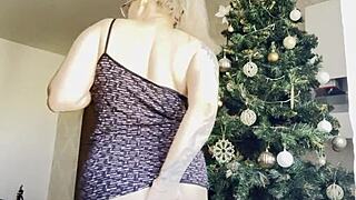 big tits blonde teen 18+ masturbates near the christmas tree, touching her natural boobs and pussy.