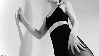 Sexy brunette teases her ass and feet in fishnet tights from a POV angle