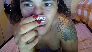 This verification video features a shemale in a simple setting