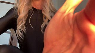 Blonde in Stocking Suit Enjoys Intimate Encounter with Muscular Partner