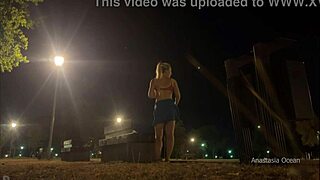 Changing clothes in a public park at night