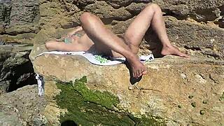 African Prostitute Shows Off on Nudist Beach