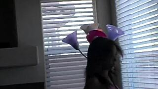 Mandy performs a striptease for the camera in bikini.