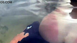 a stranger feeds my cum to fish right on the beach in front of everyone